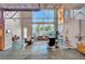 Bright living room with soaring ceilings, large windows and an open floor plan; great for entertaining at 5096 Thunder River Cir, Las Vegas, NV 89148