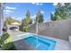 A stunning private pool provides the perfect backyard retreat, with a serene patio and lounge area nearby at 5096 Thunder River Cir, Las Vegas, NV 89148