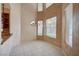 Bright dining area featuring tile floors, chandelier and multiple windows at 5405 Ireland St, Las Vegas, NV 89149