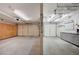 A spacious three car garage with built in cabinets for additional storage at 5405 Ireland St, Las Vegas, NV 89149