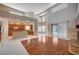 Open floor plan with kitchen, dining, and living area with fireplace and outside patio access at 5405 Ireland St, Las Vegas, NV 89149