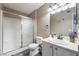 Well-maintained bathroom with a shower and a single sink vanity at 5710 E Tropicana Ave # 2122, Las Vegas, NV 89122