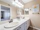Bathroom with double sink vanity and decorative accents, creating a modern space at 5710 E Tropicana Ave # 2122, Las Vegas, NV 89122