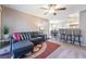 Bright and cozy living space that connects seamlessly to the dining area and kitchen at 5710 E Tropicana Ave # 2122, Las Vegas, NV 89122