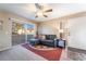 Inviting living room featuring a comfortable sofa, large window, and neutral decor at 5710 E Tropicana Ave # 2122, Las Vegas, NV 89122