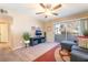 Relaxing living room with stylish furniture, sliding glass doors, and modern decor at 5710 E Tropicana Ave # 2122, Las Vegas, NV 89122
