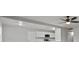 Bright, remodeled kitchen featuring white cabinets and stainless steel appliances at 6437 Burgundy Way, Las Vegas, NV 89107