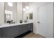 Modern bathroom with dual vanities and stylish fixtures at 6961 Emerald Springs Ln, Las Vegas, NV 89113