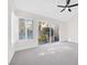 Bedroom with a sliding glass door to backyard pool, plantation shutters and fan at 6961 Emerald Springs Ln, Las Vegas, NV 89113