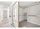 Walk-in closet with ample shelving and storage space at 6961 Emerald Springs Ln, Las Vegas, NV 89113