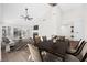 Open floor plan with dining area, living room, fireplace, and plenty of natural light at 6961 Emerald Springs Ln, Las Vegas, NV 89113