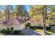 Charming single-story home with a red tile roof, attached garage, and well-manicured landscaping at 6961 Emerald Springs Ln, Las Vegas, NV 89113