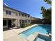 Large backyard with pool, sun shelf, seating area and upstairs balcony at 7109 Rancho De Taos, Las Vegas, NV 89130