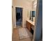 Functional bathroom with classic cabinets, a patterned rug, and good lighting fixtures at 7109 Rancho De Taos, Las Vegas, NV 89130