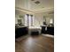 Bright primary bathroom features a soaking tub and dual vanities, complete with wood-look flooring at 7109 Rancho De Taos, Las Vegas, NV 89130