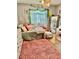 Stylish bedroom featuring a fluffy rug, soft decor, and a large full-length mirror at 7109 Rancho De Taos, Las Vegas, NV 89130