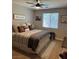 Cozy bedroom featuring neutral decor, comfortable bedding, and natural light from the window at 7109 Rancho De Taos, Las Vegas, NV 89130