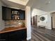 Stylish entryway showcasing hardwood floors, a sliding barn door, and a decorative mirror at 7109 Rancho De Taos, Las Vegas, NV 89130