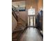 Grand foyer with high ceilings, wood floors, and a staircase leading to the second floor at 7109 Rancho De Taos, Las Vegas, NV 89130