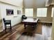 Bright game room with a pool table, light wood flooring, and large windows at 7109 Rancho De Taos, Las Vegas, NV 89130