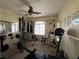 Spacious home gym equipped with weight machines and mirrors at 7109 Rancho De Taos, Las Vegas, NV 89130