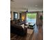 Cozy living room with a sliding door to the patio and private pool area at 7109 Rancho De Taos, Las Vegas, NV 89130