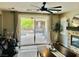 Living area with fireplace and sliding glass door to the outdoor pool and patio area at 7109 Rancho De Taos, Las Vegas, NV 89130