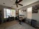 Bright office with ample natural light, work desk, and organized storage solutions at 7109 Rancho De Taos, Las Vegas, NV 89130