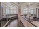 Modern bathroom features a jacuzzi tub, tiled shower, and recessed lighting at 72 Innisbrook Ave, Las Vegas, NV 89113
