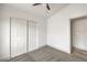 Bedroom featuring a ceiling fan, and closet with sliding doors at 7413 Red Eagle St, Las Vegas, NV 89131