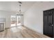 Bright dining area features wood floors and easy access to the backyard at 7413 Red Eagle St, Las Vegas, NV 89131