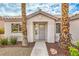 Inviting front entrance showcases the home's charming curb appeal at 7413 Red Eagle St, Las Vegas, NV 89131