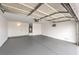 Spacious garage with painted floor, ample storage, and good lighting at 7413 Red Eagle St, Las Vegas, NV 89131