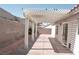 Back patio featuring a pergola with abundant sunlight and a private block wall at 7413 Red Eagle St, Las Vegas, NV 89131