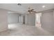 Upstairs bonus room with neutral carpet and a bright, open floor plan at 9017 Wolf Dancer Ave, Las Vegas, NV 89143