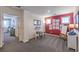 Bright and airy bonus room featuring a fun activity area and soft, comfortable carpeting at 4755 Bluebird Cliffs Ave Dr # Lot 173, Las Vegas, NV 89141
