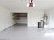 Spacious garage offering ample storage space and epoxy flooring at 1004 Windy Ferrell Ave, North Las Vegas, NV 89081