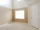 Bright, welcoming living room with neutral tones and plenty of space for customization at 1004 Windy Ferrell Ave, North Las Vegas, NV 89081