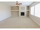 Spacious living room features a modern fireplace and ample natural light at 1004 Windy Ferrell Ave, North Las Vegas, NV 89081