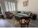 Cozy living room featuring modern furniture, hardwood floors, and a neutral color palette at 10071 Lemon Valley Ave, Las Vegas, NV 89147