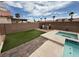 Lush backyard featuring an inviting in-ground pool and a spa at 10071 Lemon Valley Ave, Las Vegas, NV 89147