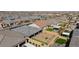 Aerial view of the community showcasing backyard and a variety of roof designs at 10095 Ferton Lake Ave, Las Vegas, NV 89178