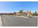 Exterior street view showcasing the community entrance sign for Hitchfield & Windham under a bright blue sky at 10095 Ferton Lake Ave, Las Vegas, NV 89178