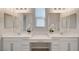 Bathroom boasts dual sinks, stylish mirrors, and a functional vanity area at 10251 Tiger Milkweed St, Las Vegas, NV 89141