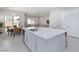 Kitchen island with dining area and living area at 10251 Tiger Milkweed St, Las Vegas, NV 89141