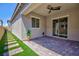 Covered patio with brick flooring and lush landscaping at 10251 Tiger Milkweed St, Las Vegas, NV 89141