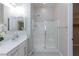 Bright bathroom with glass shower, dual vanity, and ample counter space, perfect for a modern lifestyle at 10251 Tiger Milkweed St, Las Vegas, NV 89141