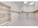 Walk-in closet featuring extensive shelving and rod system for optimal storage at 10251 Tiger Milkweed St, Las Vegas, NV 89141