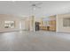 Open-concept living room and kitchen area featuring lots of natural light and recessed lighting at 10809 Clarion Ln, Las Vegas, NV 89134