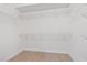 Spacious walk-in closet with ample shelving and storage space ready for organization at 10809 Clarion Ln, Las Vegas, NV 89134